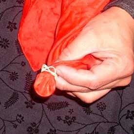 Coin vanish magic trick with kerchief